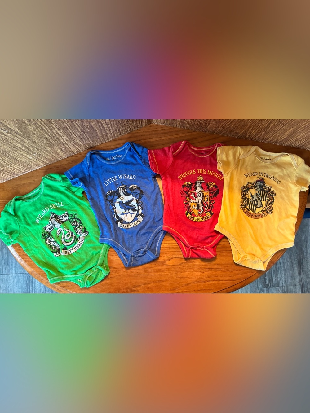 Harry Potter Hogwarts House Baby Onesies Set - Green, Blue, Red, Yellow-12 mo.